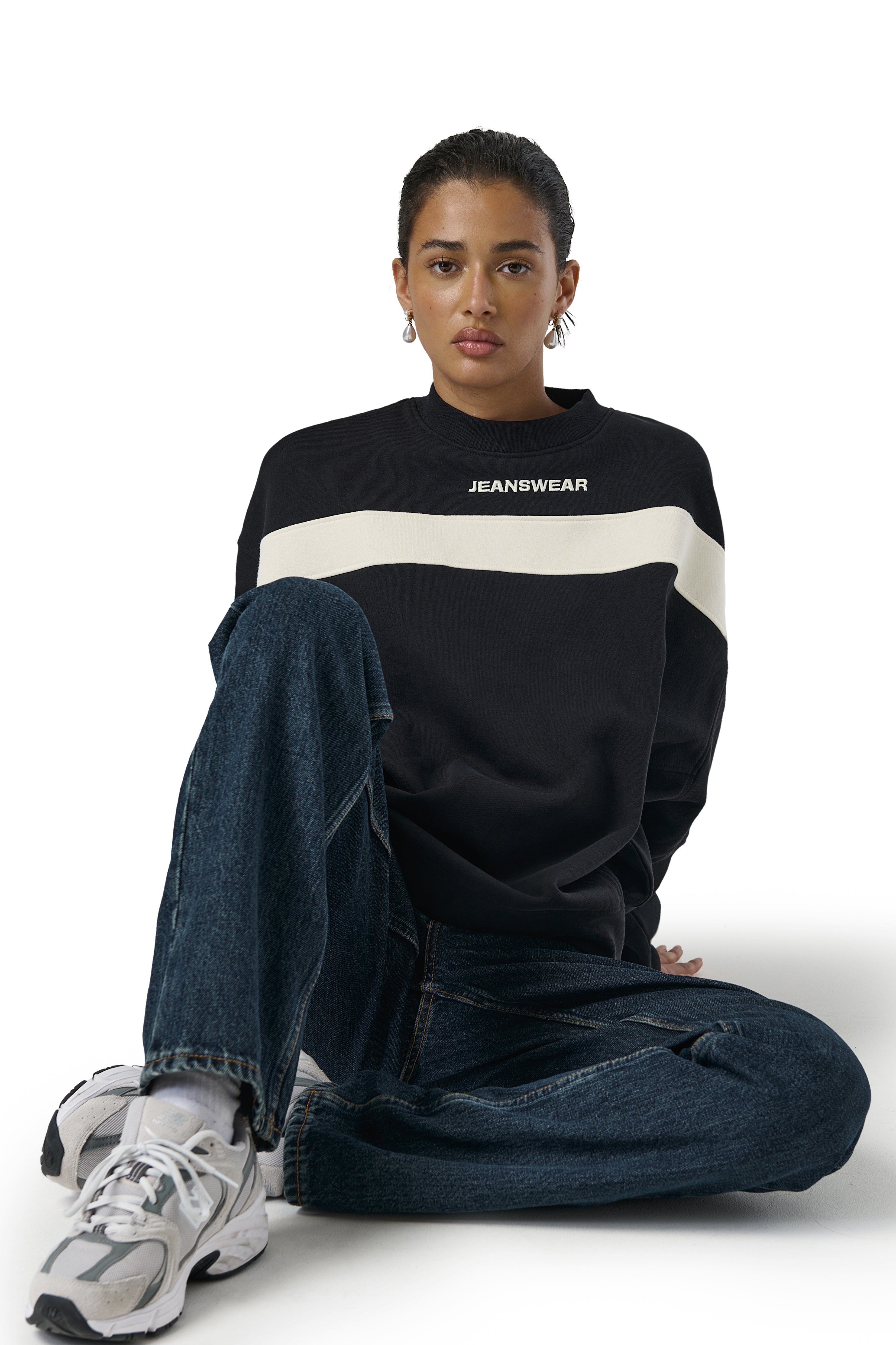Model Iman is 5'8 and wears size S.